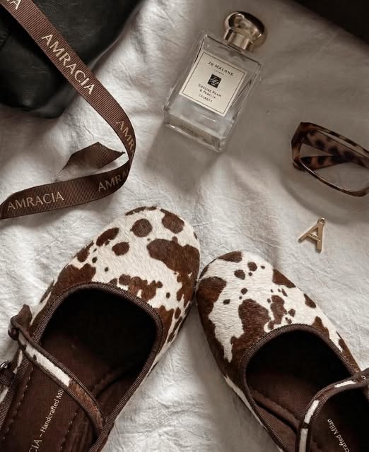 Cowhide clogs — original AMRACĪA brand photograph